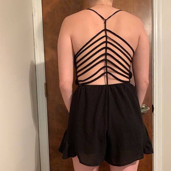 Tea n Cup Dresses & Skirts - Tea & Cup black romper with caged open back EUC